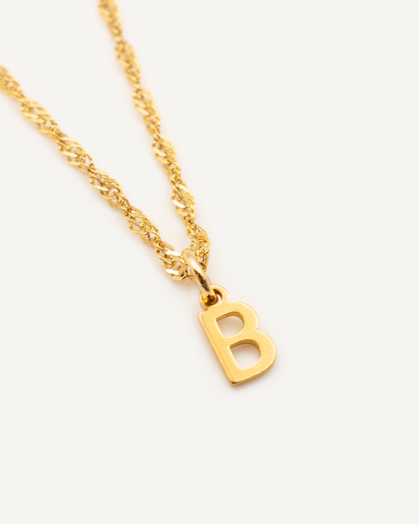 Charm Letra gold